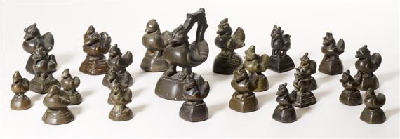 Appraisal: A SET OF OPIUM BRONZE WEIGHTS Burma height to cm