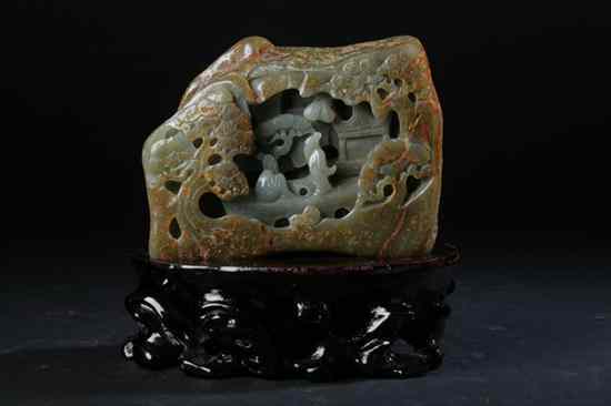 Appraisal: CHINESE CELADON AND RUSSET JADE BOULDER Carved to depict figures