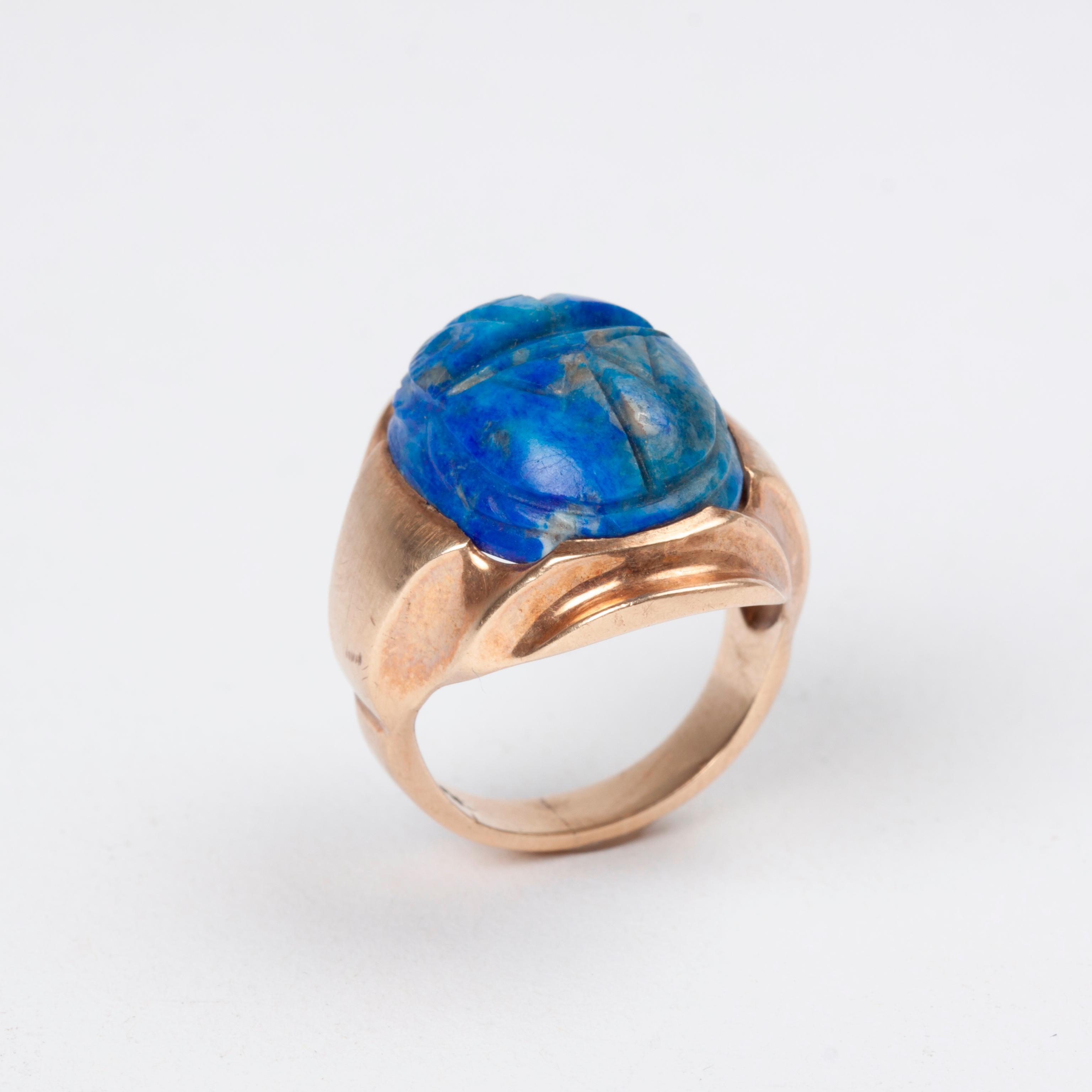 Appraisal: LAPIS CARVED SCARAB RING K Large ring with a lapis