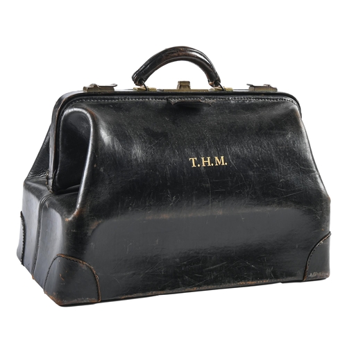 Appraisal: A good quality black leather bag lettered in gilt T