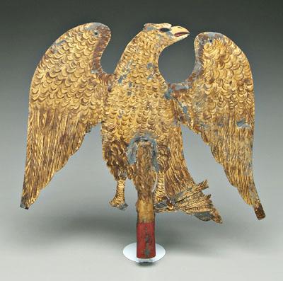 Appraisal: Gilt and polychrome metal eagle spread wings holding arrows probably