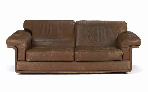 Appraisal: A De Sede brown leather upholstered sofa s height in