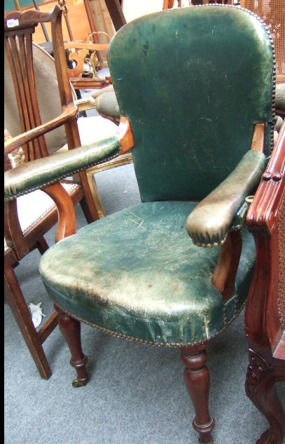 Appraisal: A th century mahogany framed open armchair the studded leather