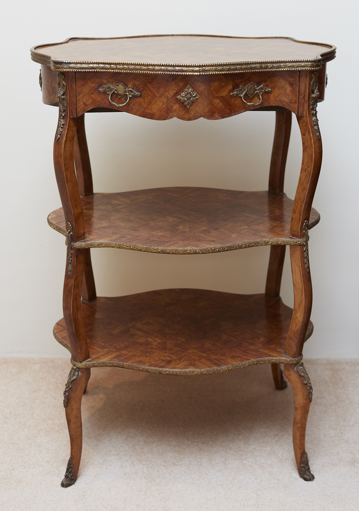 Appraisal: A LOUIS XV STYLE PARQUETRY GUERIDON With brass mounts the