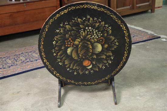 Appraisal: SMALL TILT TOP TABLE Black painted table with round stencil