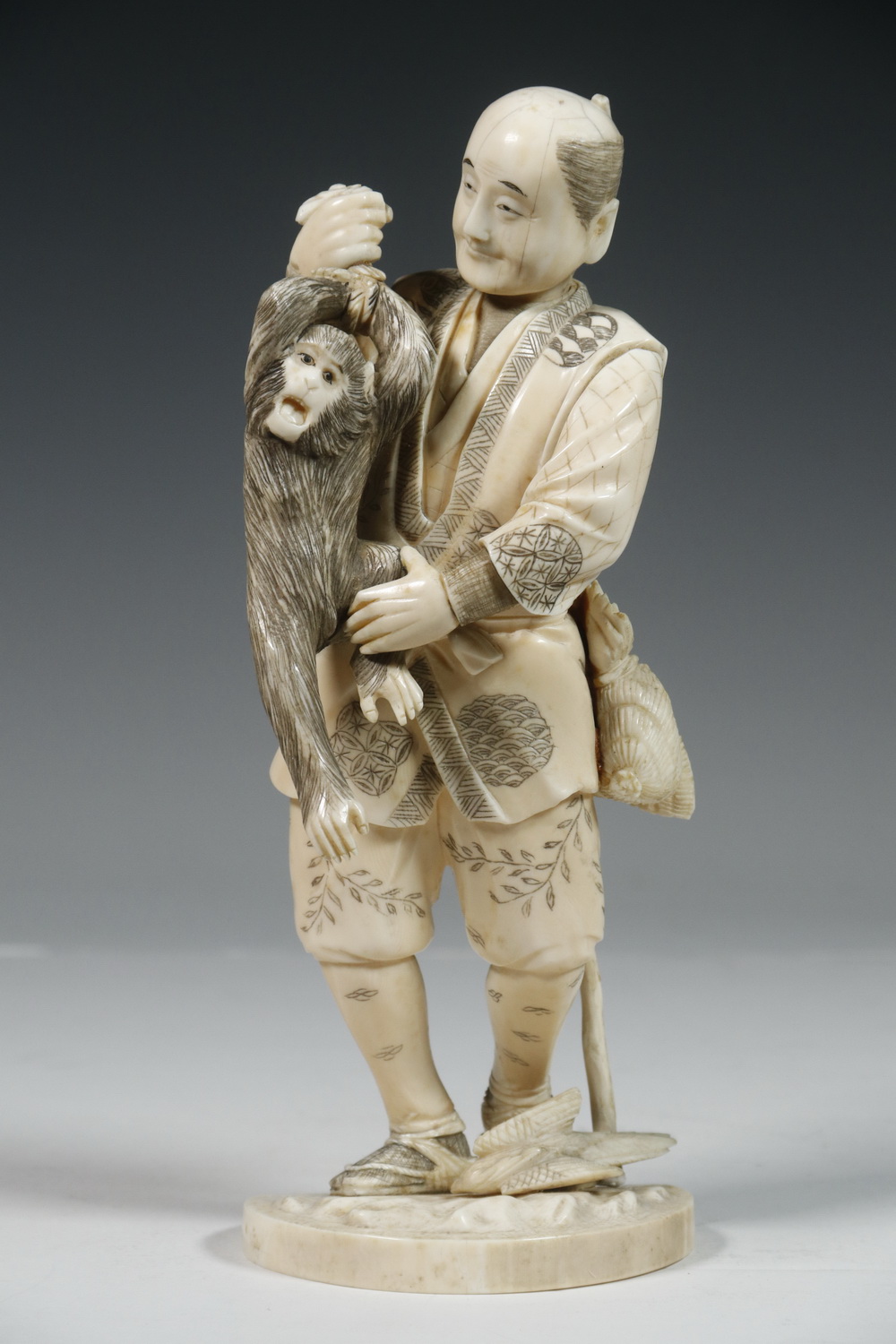 Appraisal: TH C JAPANESE CABINET FIGURE Okimono of a Standing Man