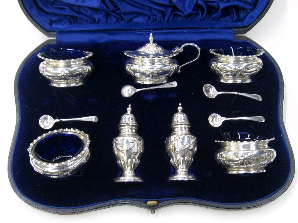 Appraisal: Cased seven piece condiment set Sheffield