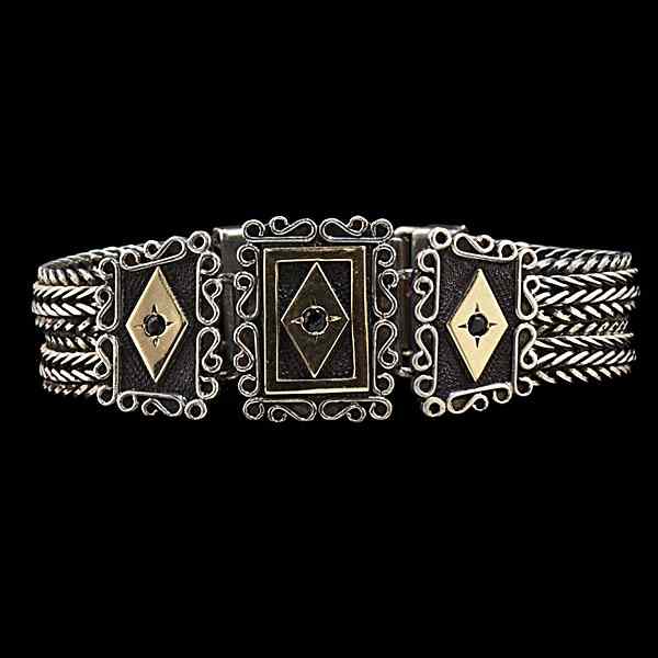 Appraisal: Sterling Silver Gold Plate Sapphires Sterling silver woven design bracelet