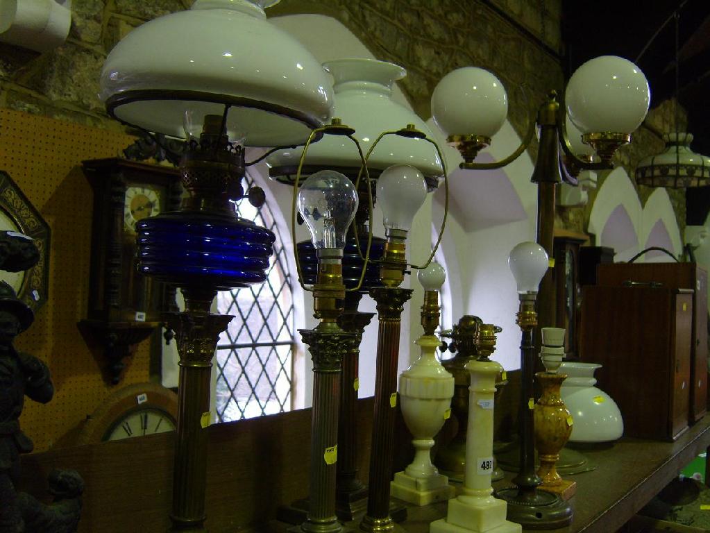 Appraisal: An extensive collection of lighting including a pair of table