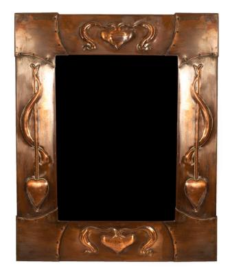 Appraisal: An Arts Crafts style copper mirror the frame embossed heart