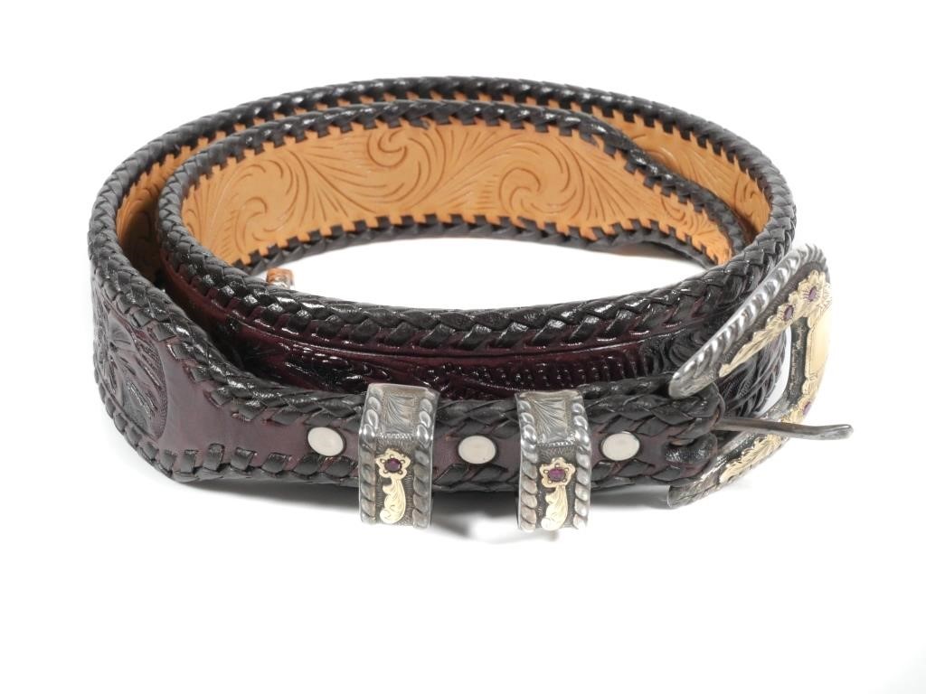 Appraisal: Stunning hand-tooled leather belt with k gold on sterling silver