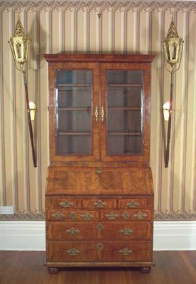 Appraisal: A Queen Anne bureau cabinet the moulded cornice above a