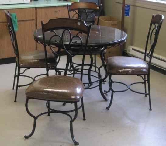 Appraisal: CONTEMPORARY FIVE-PIECE DINETTE SET round table and four matching chairs