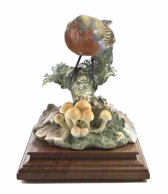 Appraisal: A Royal Worcester Dorothy Doughty Bird Robin depicted in the