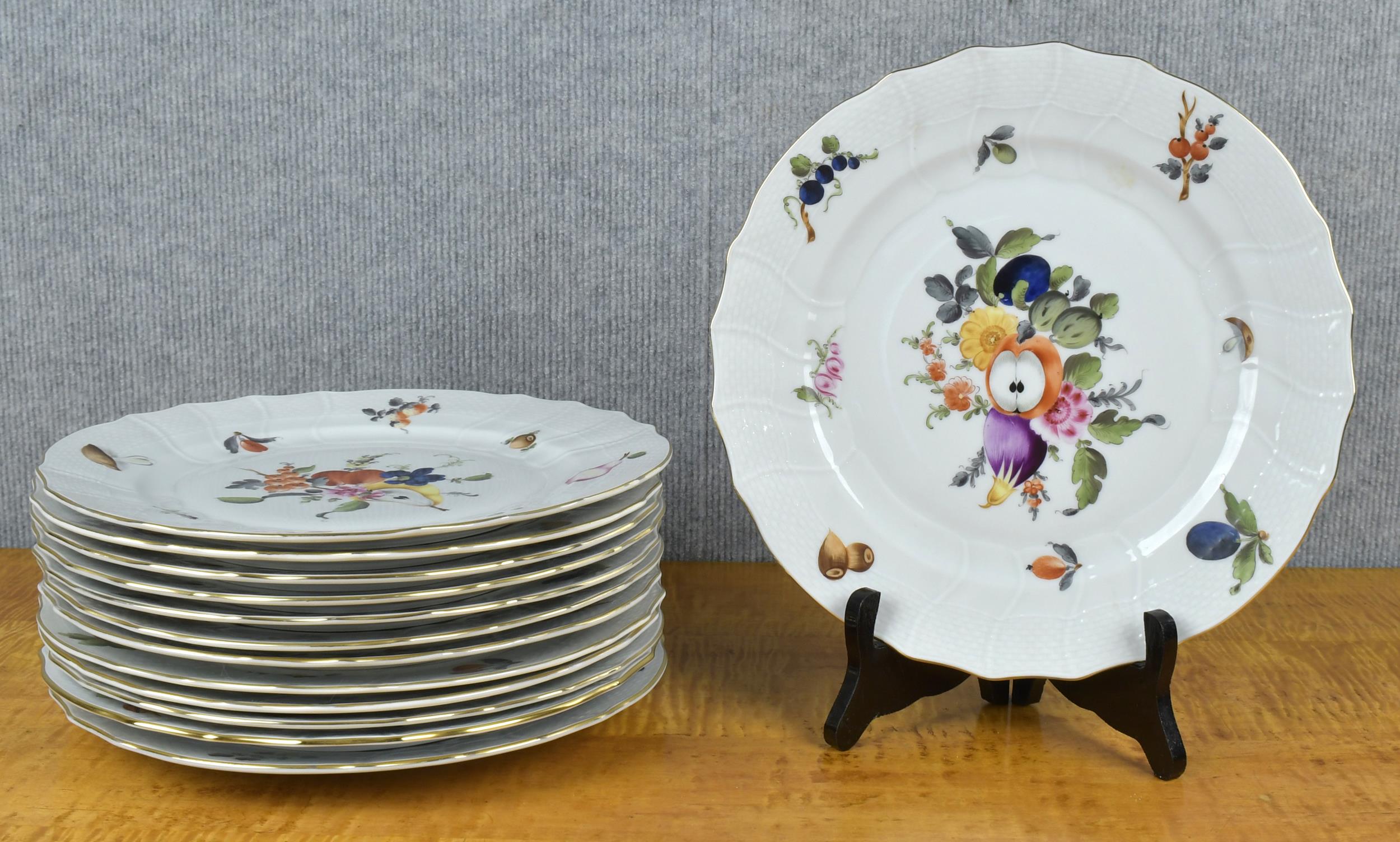 Appraisal: HEREND MARKET GARDEN PORCELAIN DINNER PLATES A matched set of