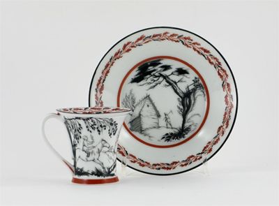 Appraisal: A Russian porcelain cup and saucer possibly by Mikhail Adamovich