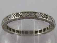 Appraisal: A white metal tests platinum and diamond eternity ring size