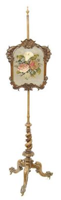 Appraisal: A Victorian walnut pole firescreen the later urn finial to