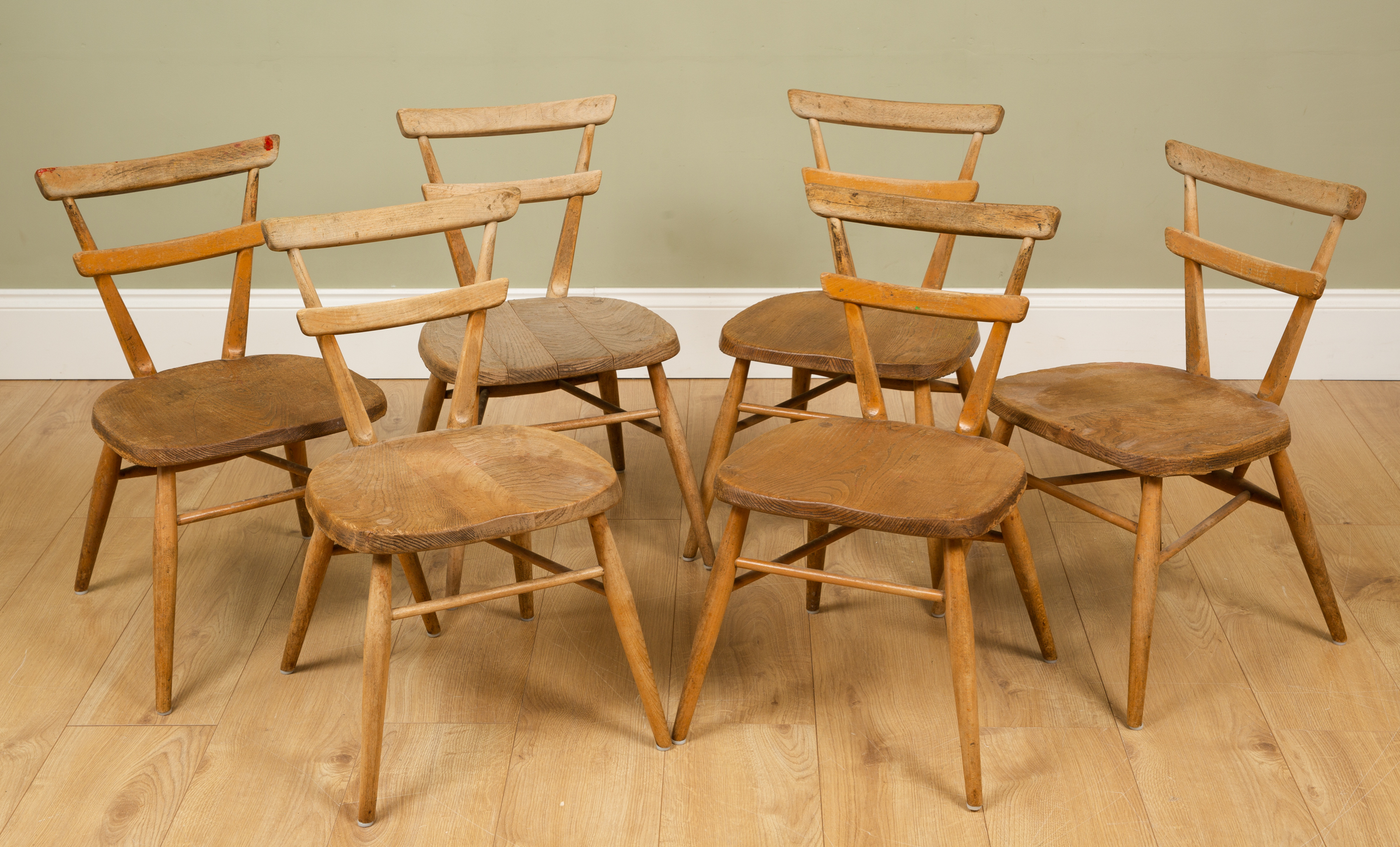 Appraisal: A set of six Ercol small elm chairs five with