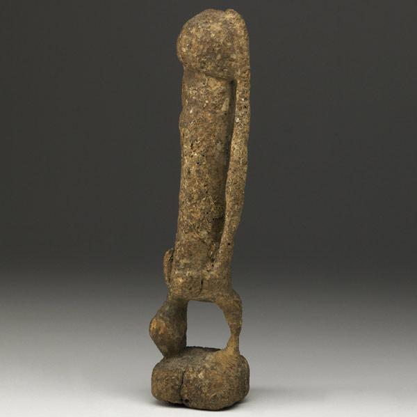 Appraisal: DOGON TELLUM ANCESTOR FETISH MALI Heavily incrusted shrine object with