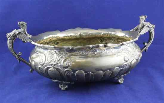 Appraisal: An Edwardian demi fluted silver oval fruit bowl with two