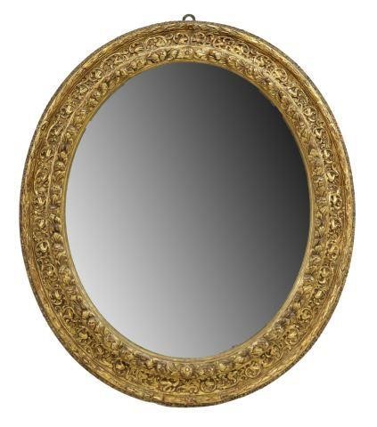 Appraisal: Italian giltwood mirror early th c oval frame with laurel