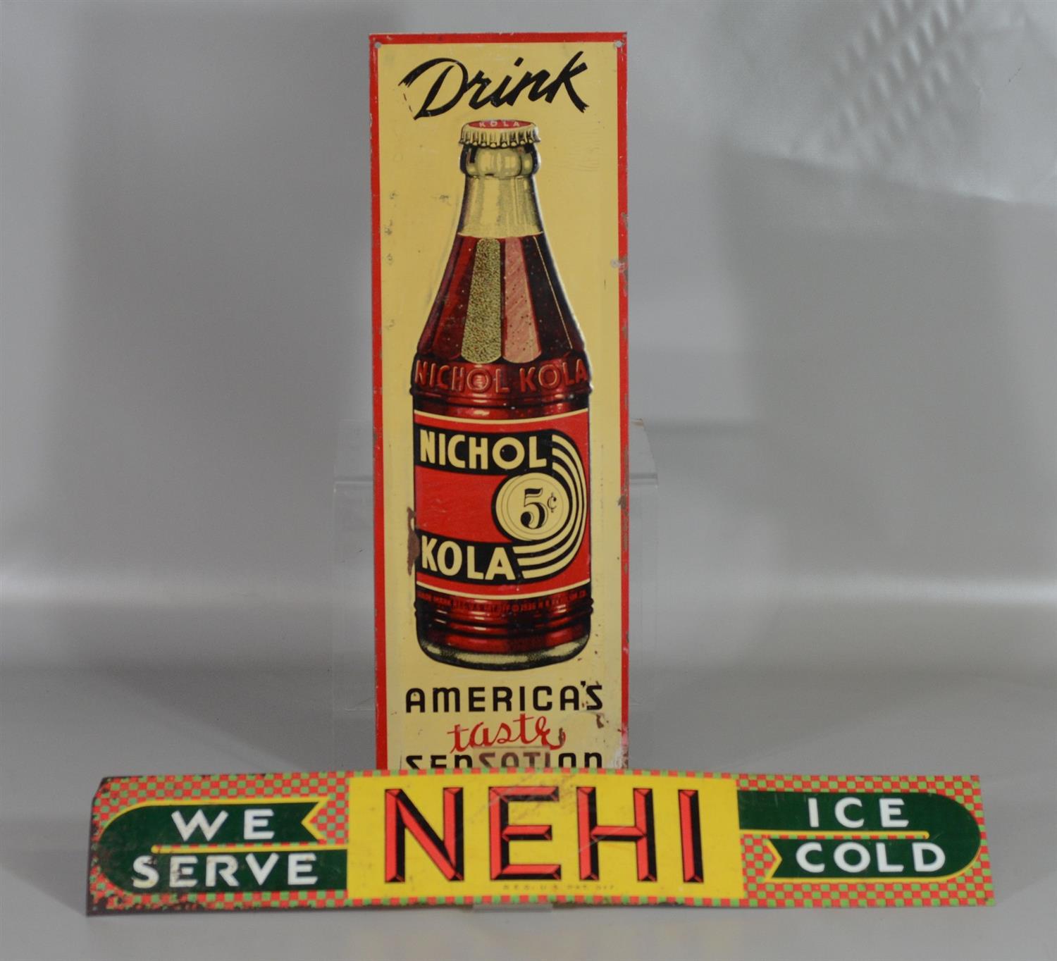 Appraisal: Enameled Metal Soft Drink Signs Nichol Kola x - Nehi