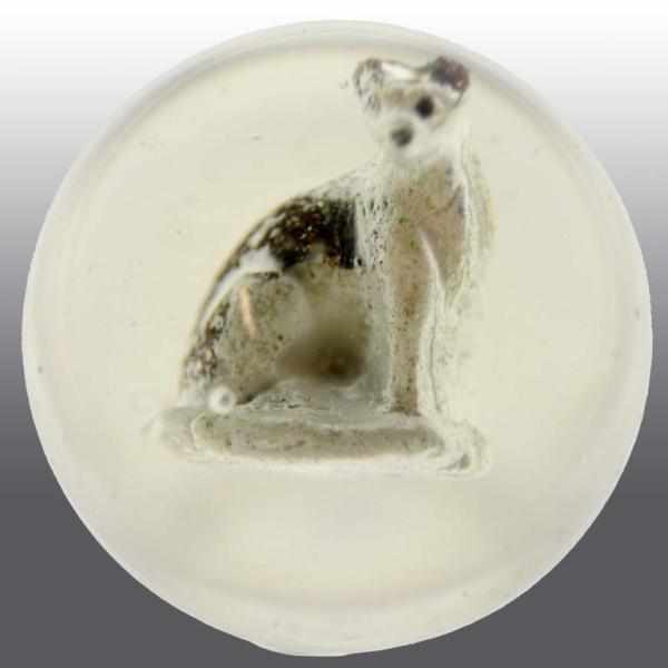 Appraisal: Painted Dog Sulfide Marble Description Figure of a seated dog