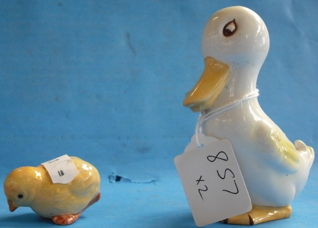 Appraisal: Beswick Duck with ladybird on Beak and Chick Pecking