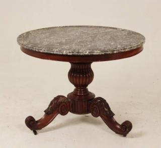 Appraisal: CONTINENTAL CARVED MAHOGANY CENTER TABLE WITH ORIGINAL GREY GRANITE TOP