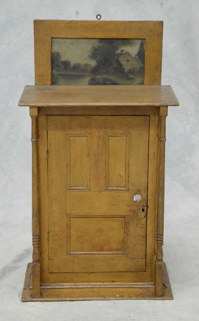 Appraisal: Grain painted Lancaster County hanging cupboard with turned spindle hooded