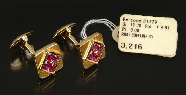 Appraisal: A pair of carat yellow gold and ruby cufflinks by