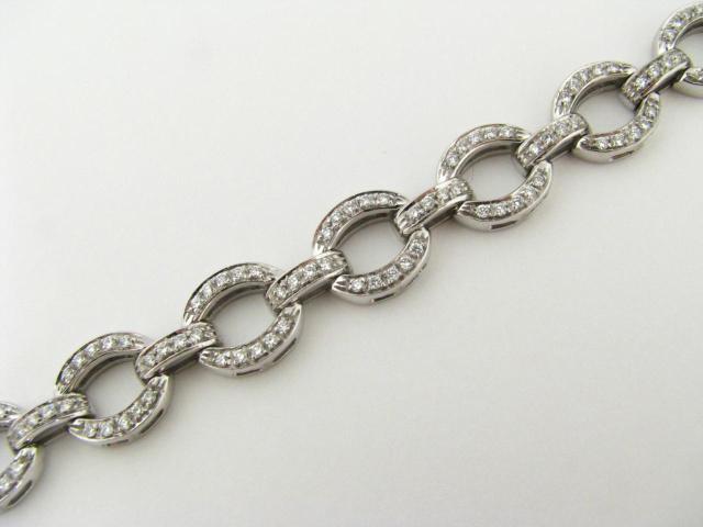 Appraisal: K white gold oval link bracelet with VS diamonds fine