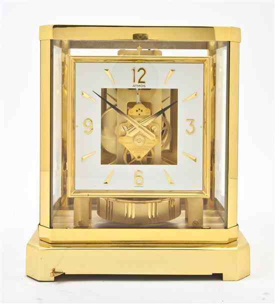 Appraisal: A Swiss Brass and Glass Atmos Clock of square form