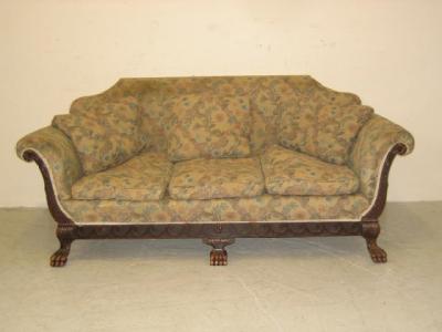 Appraisal: AN OAK FRAMED SOFA early th century upholstered in floral