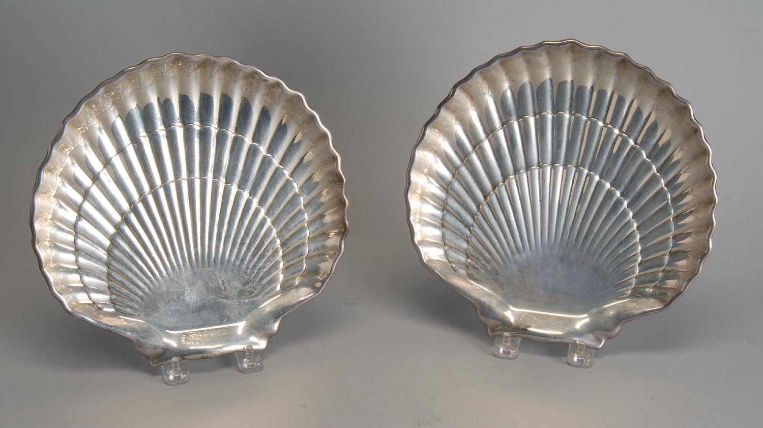 Appraisal: TWO GORHAM STERLING SILVER SCALLOP DISHES Supported on two ball