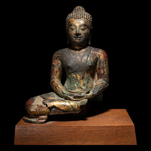 Appraisal: A Thai Gilt Decorated Bronze Figure of Seated Buddha cast