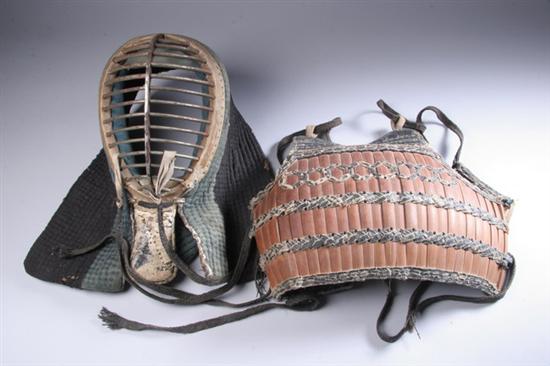 Appraisal: JAPANESE IRON AND CLOTH FENCING ARMOR Meiji period - in