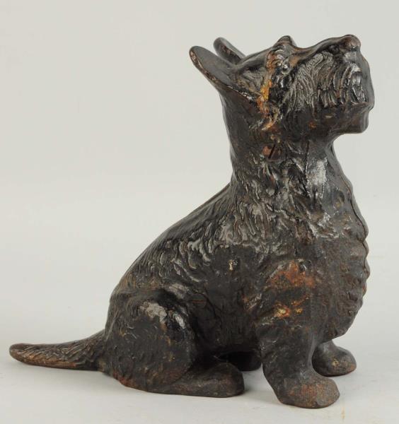 Appraisal: Cast Iron Sitting Scottie Dog Doorstop Spencer Full-figure sitting Scottie