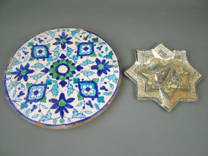 Appraisal: A Kashan lustre tile th century of star form with