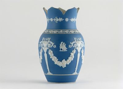 Appraisal: A Jasperware vase the neck formed as five petals decorated