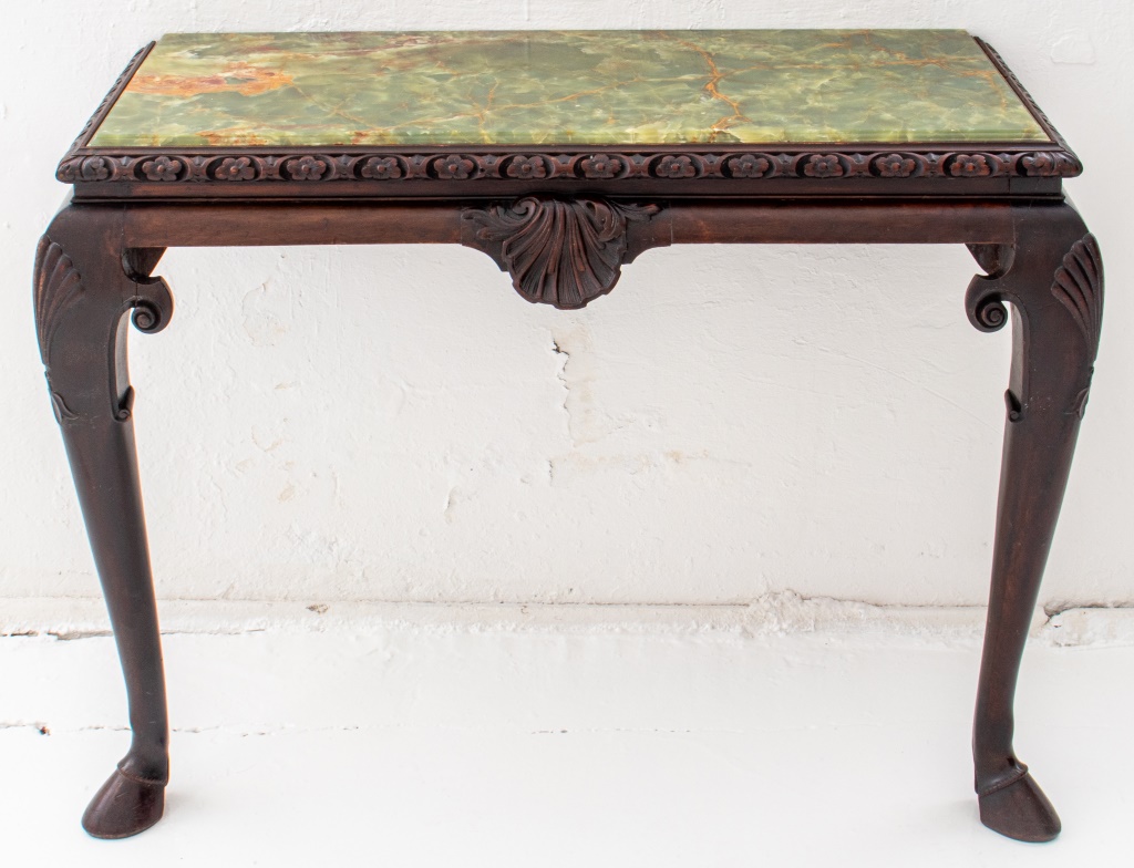 Appraisal: IRISH GEORGIAN STYLE MAHOGANY ONYX-TOP CONSOLE Irish Georgian style mahogany