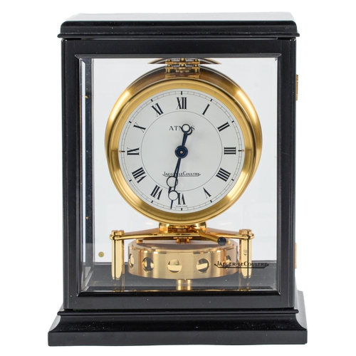 Appraisal: An Atmos clock Jaeger le Coultre No in black walnut