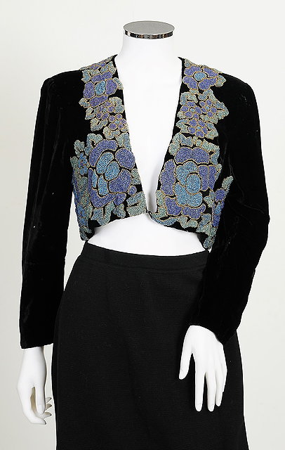 Appraisal: A s black velvet cropped jacket with heavily beaded floral