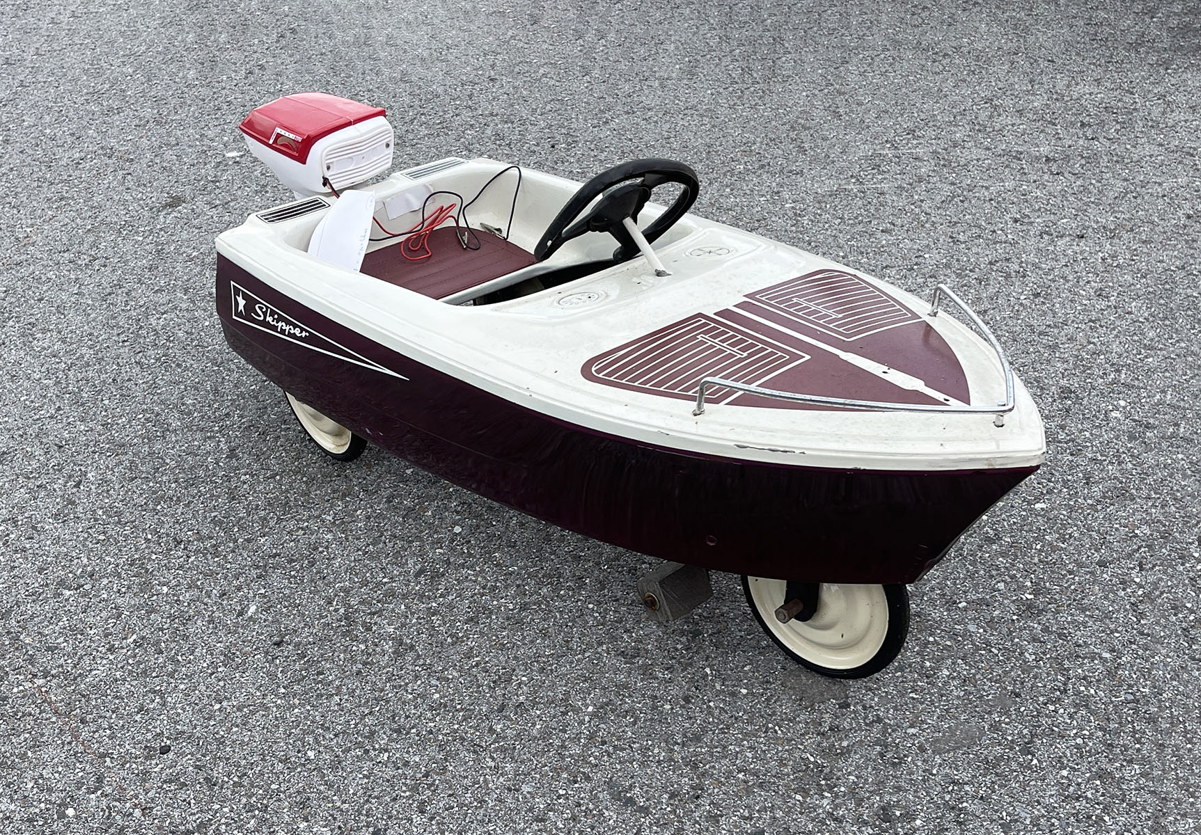 Appraisal: MURRAY SKIPPER BOAT WITH MOTOR PEDAL CAR wheeled maroon and