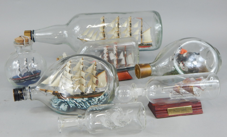 Appraisal: Various ships in a bottle a show jumper jumping a