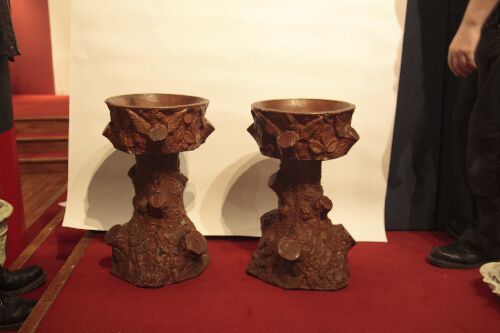 Appraisal: A pair of brown glazed terracotta planters each formed as