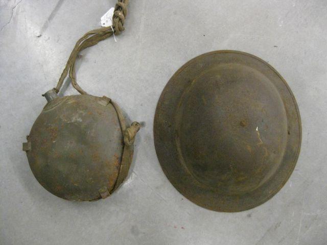 Appraisal: Military Metal Hat and Canteen WW I