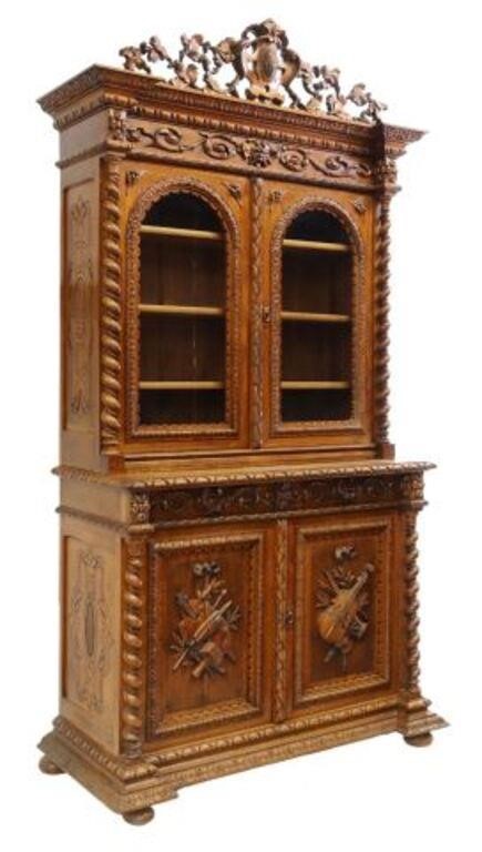 Appraisal: French carved oak bookcase th c having pierced foliate crest