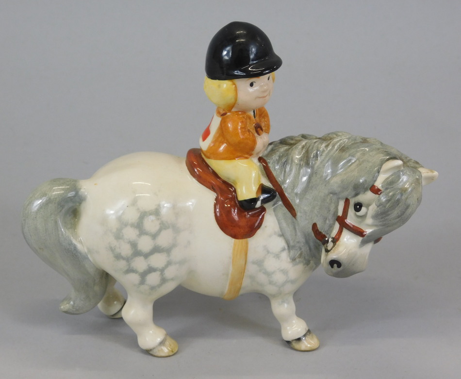 Appraisal: A John Beswick Thelwell figure of boy on horse stamped